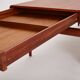 Extendable coffee table designed by Johannes Andersen for Uldum Møbelfabrik, Denmark, 1960s.