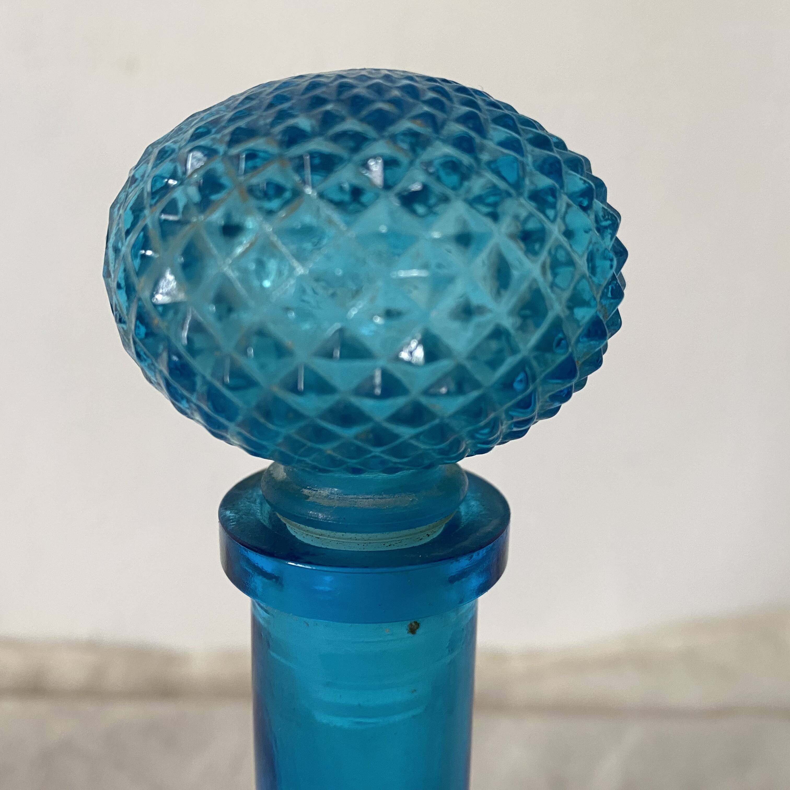 Blue glass carafe made in Belgium from the 60s