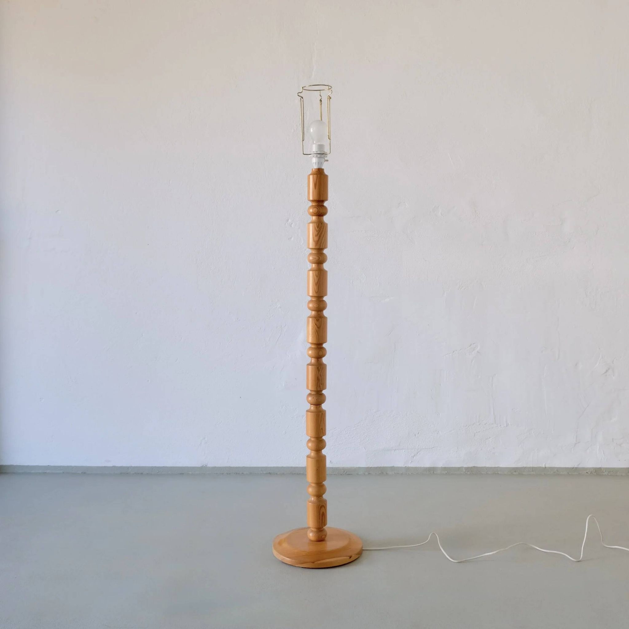 Carved pine floor lamp | Sweden | 1960s