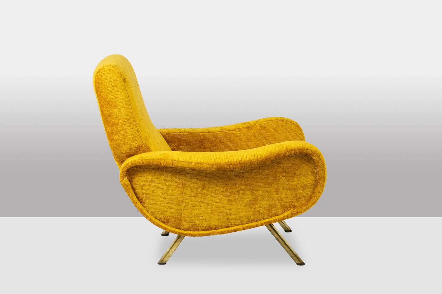 Marco Zanuso for Artflex. Yellow and gilded brass armchairs. 1950s.