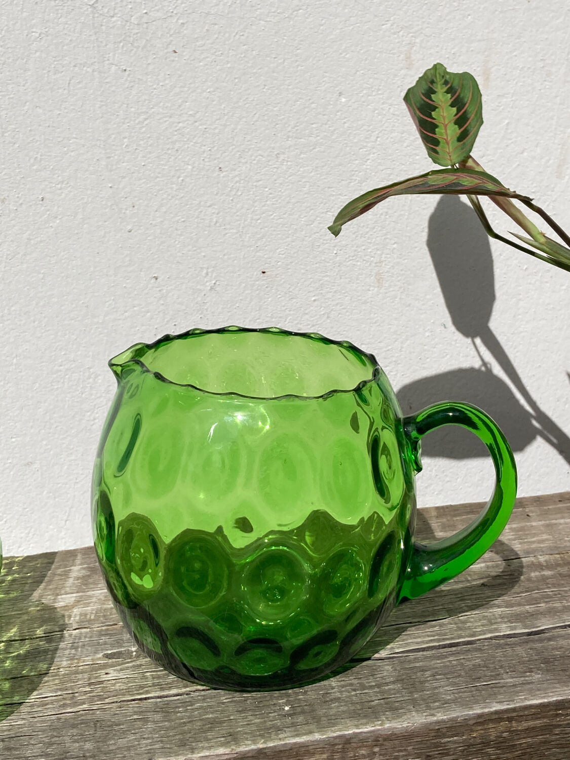 4 green water glasses and vintage blown glass carafe