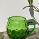 4 green water glasses and vintage blown glass carafe