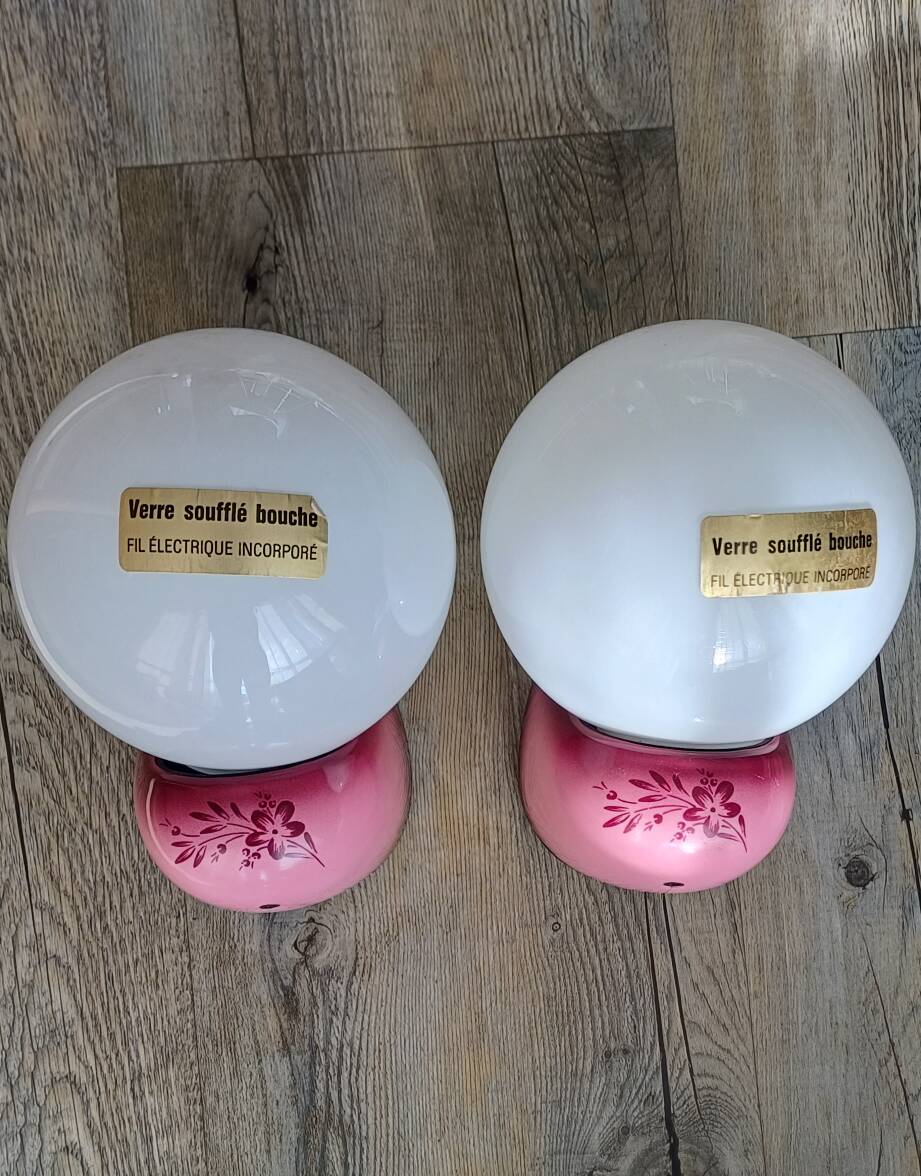 Pair of Tissot wall lights from the 70s with pink opaline glass in space age style.