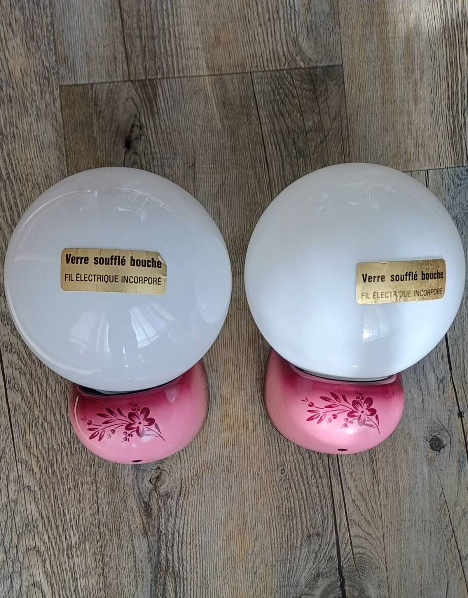 Pair of Tissot wall lights from the 70s with pink opaline glass in space age style.