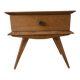 Scandinavian style bedside table with tapered legs from the 1960s.
