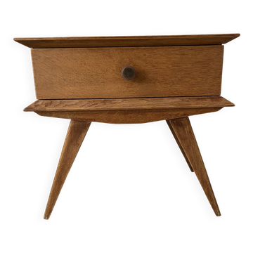 Scandinavian style bedside table with tapered legs from the 1960s.