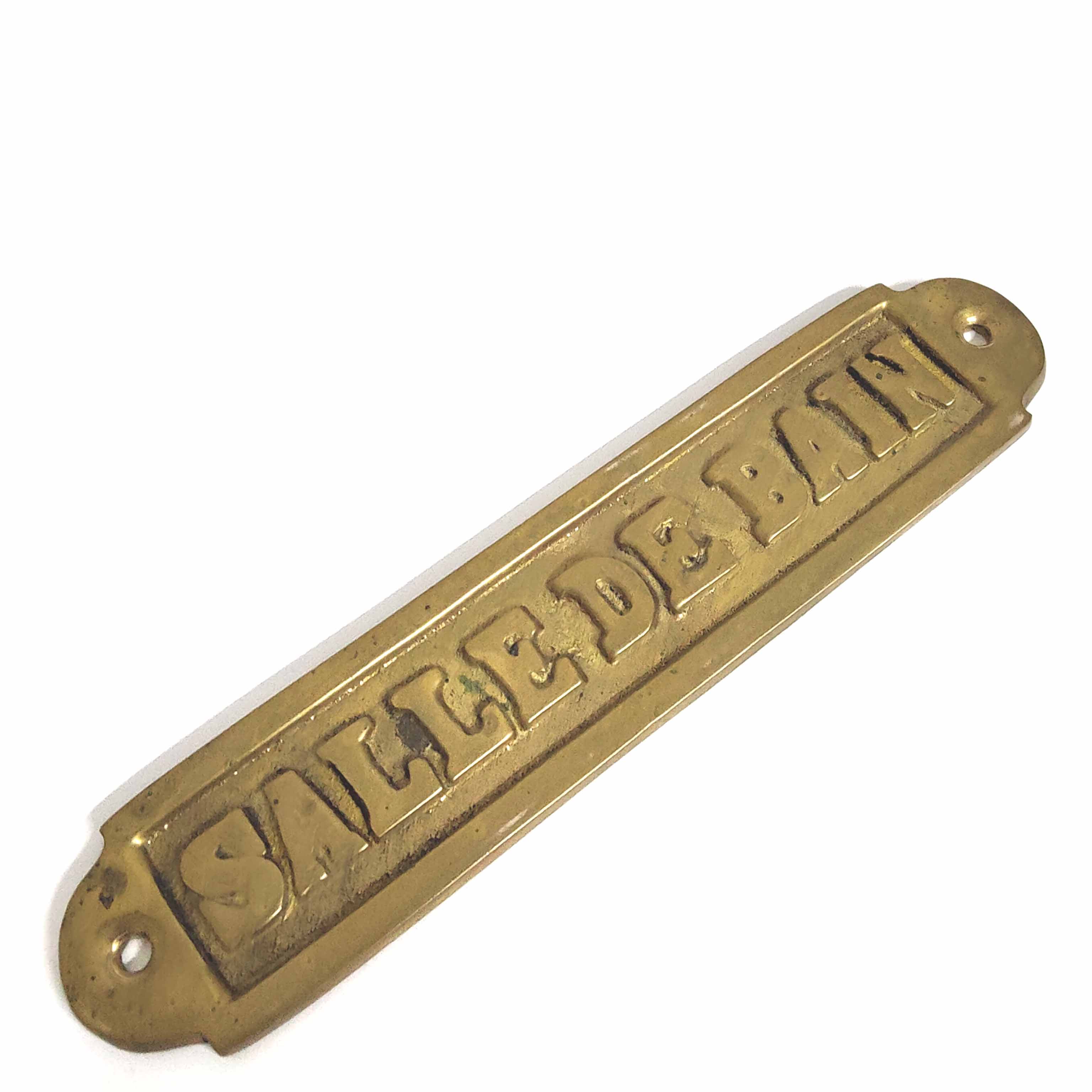 Brass bathroom door plate