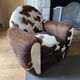 Fauteuils club en peau de vache