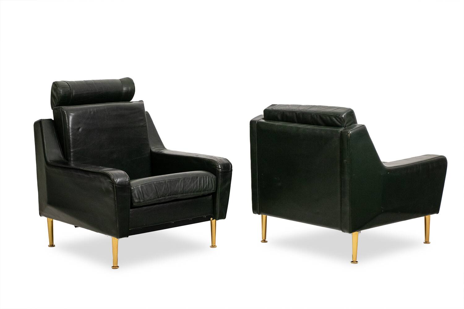 Airborne. Paire de fauteuils en cuir vert. Années 1950.