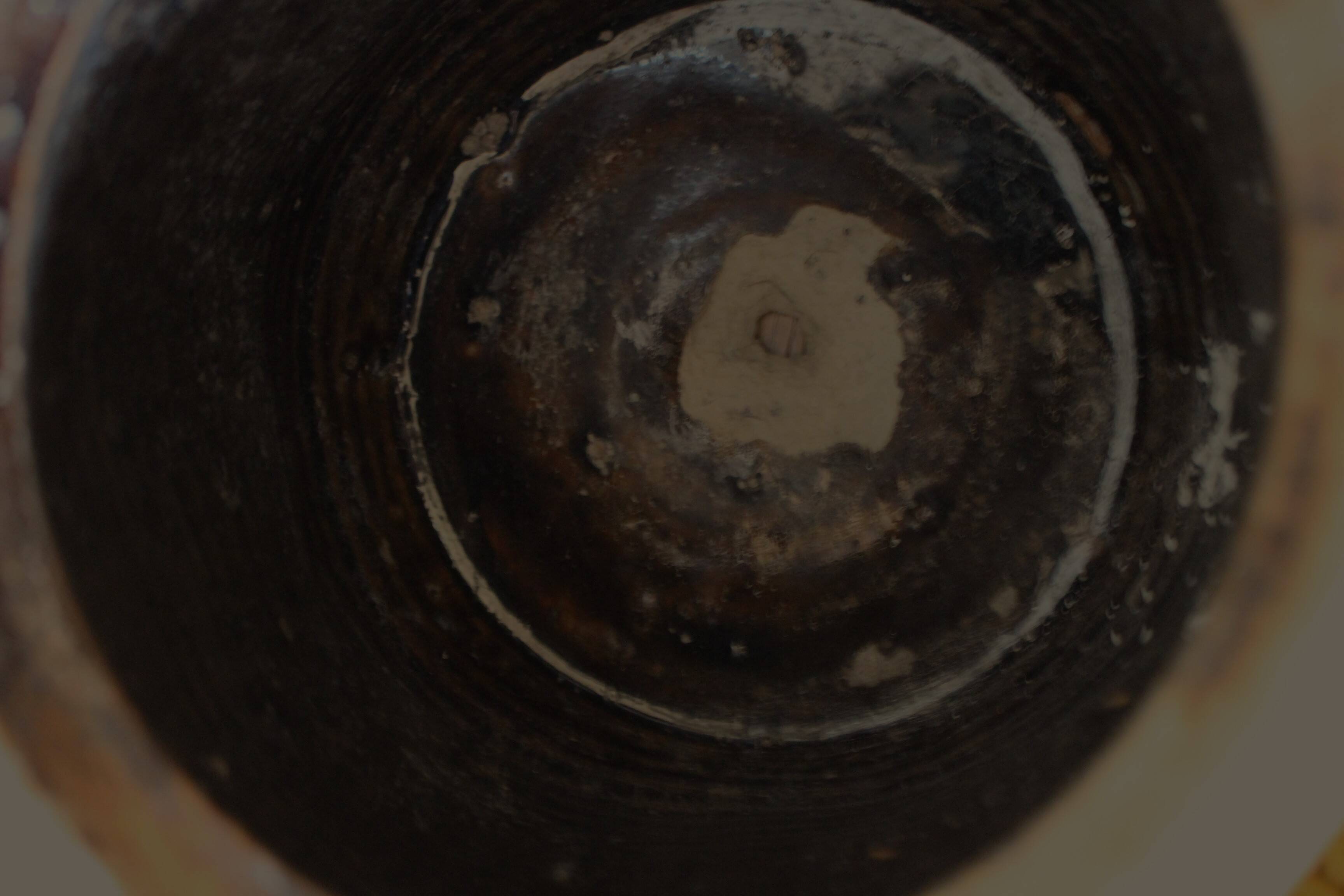 Large round terracotta pot with handle