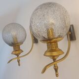 Pair of vintage gold wall sconces with transparent globes