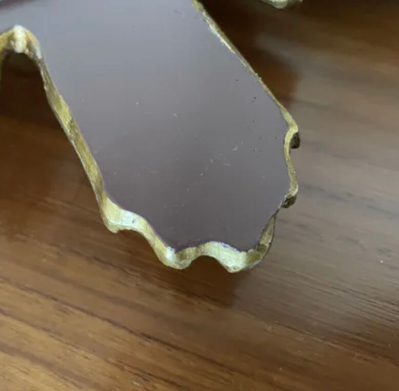 Vintage sun mirror in golden resin 60s/70s