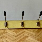 Vintage yellow wall coat rack - four hooks - 1950s
