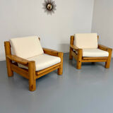 Set of 2 armchairs in solid pine with boucle fabric, 1970s Scandinavian design.