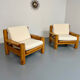Set of 2 armchairs in solid pine with boucle fabric, 1970s Scandinavian design.