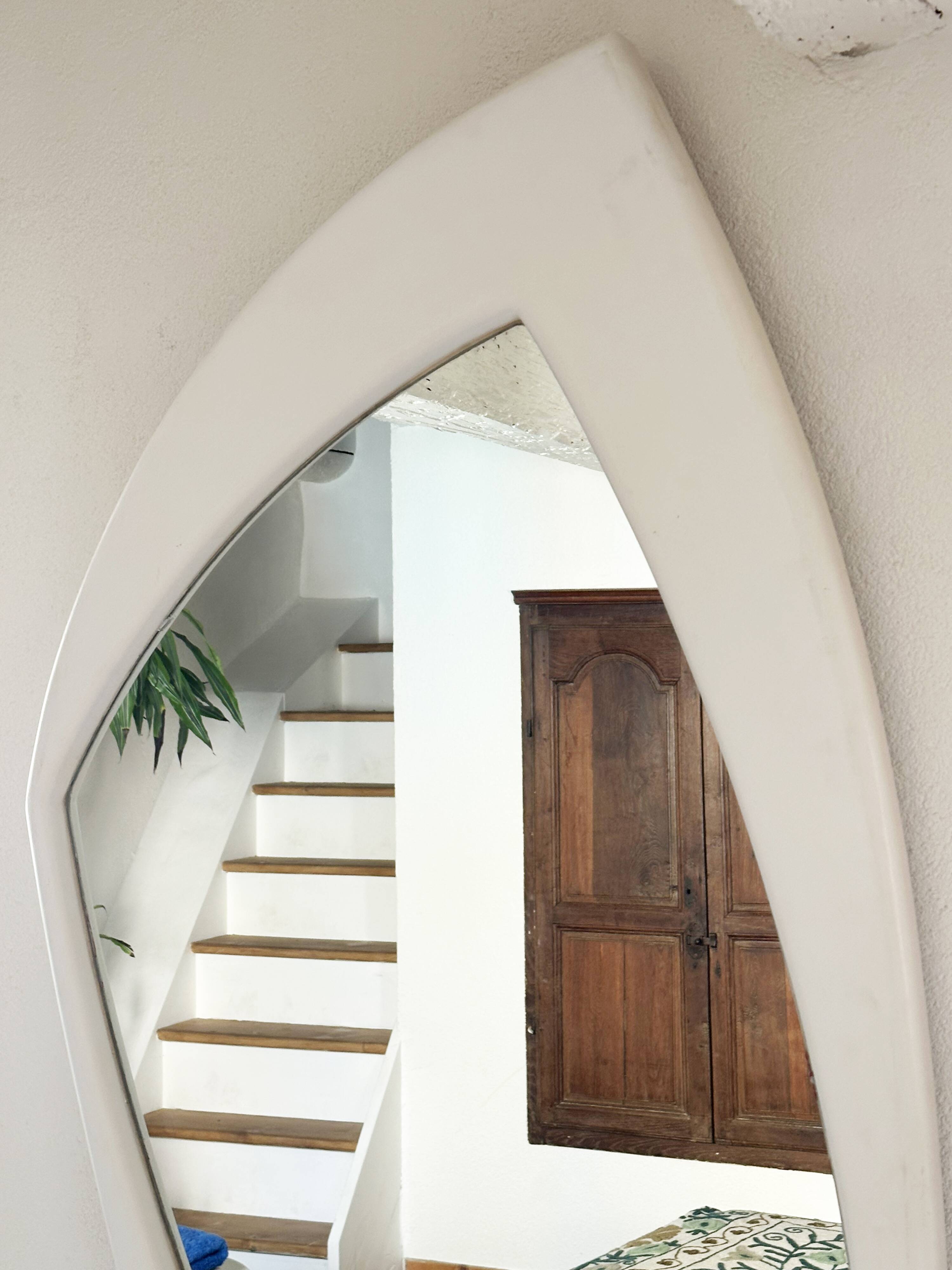 Dismantled Space Age XXL wall mirror in lacquered wood. France, 1970s.