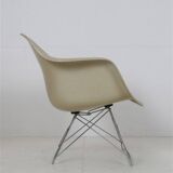 Rare Herman Miller / Charles & Ray Eames “LAR” fiberglass armchair on “Cat’s Cradle Base” / 1950s-1960s
