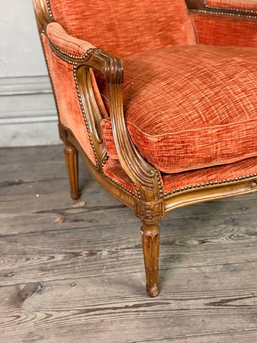 Pair of transitional carved wooden armchairs, 18th century