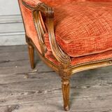 Pair of transitional carved wooden armchairs, 18th century