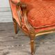 Pair of transitional carved wooden armchairs, 18th century