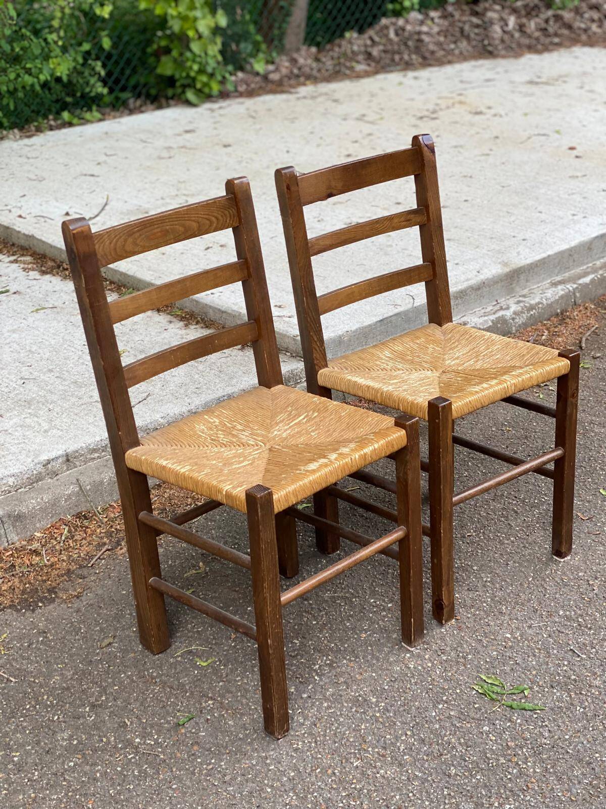 2 solid wood and straw chairs