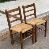 2 solid wood and straw chairs