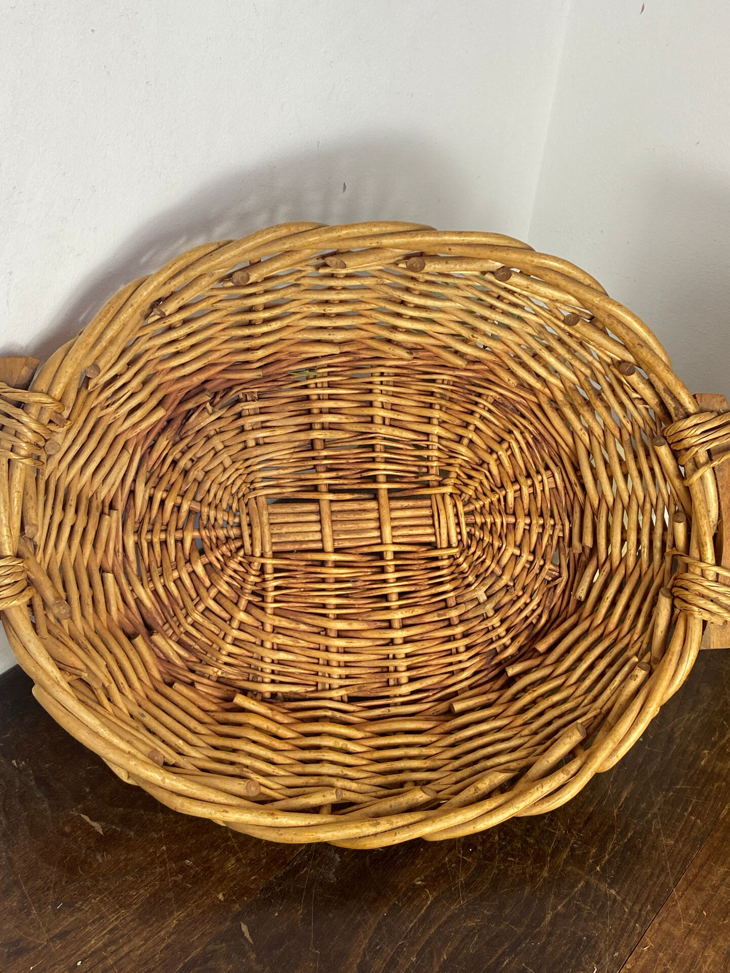 Wicker basket with wooden handles