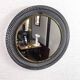 Miroir rond années 50 en métal et laiton