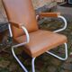 60s armchair with tubular legs, Ronéo style