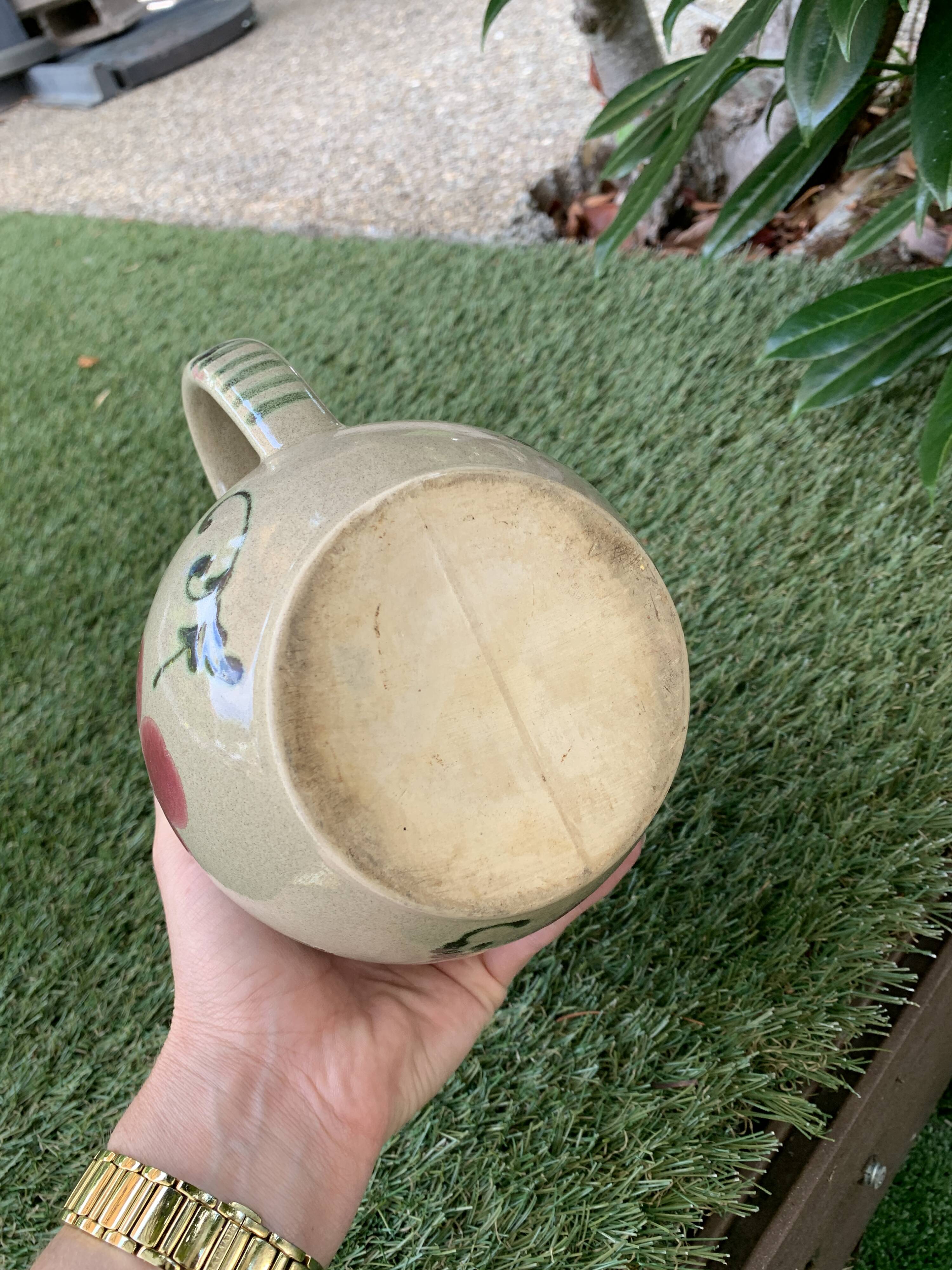 Vintage ceramic pitcher model flowers