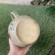 Vintage ceramic pitcher model flowers