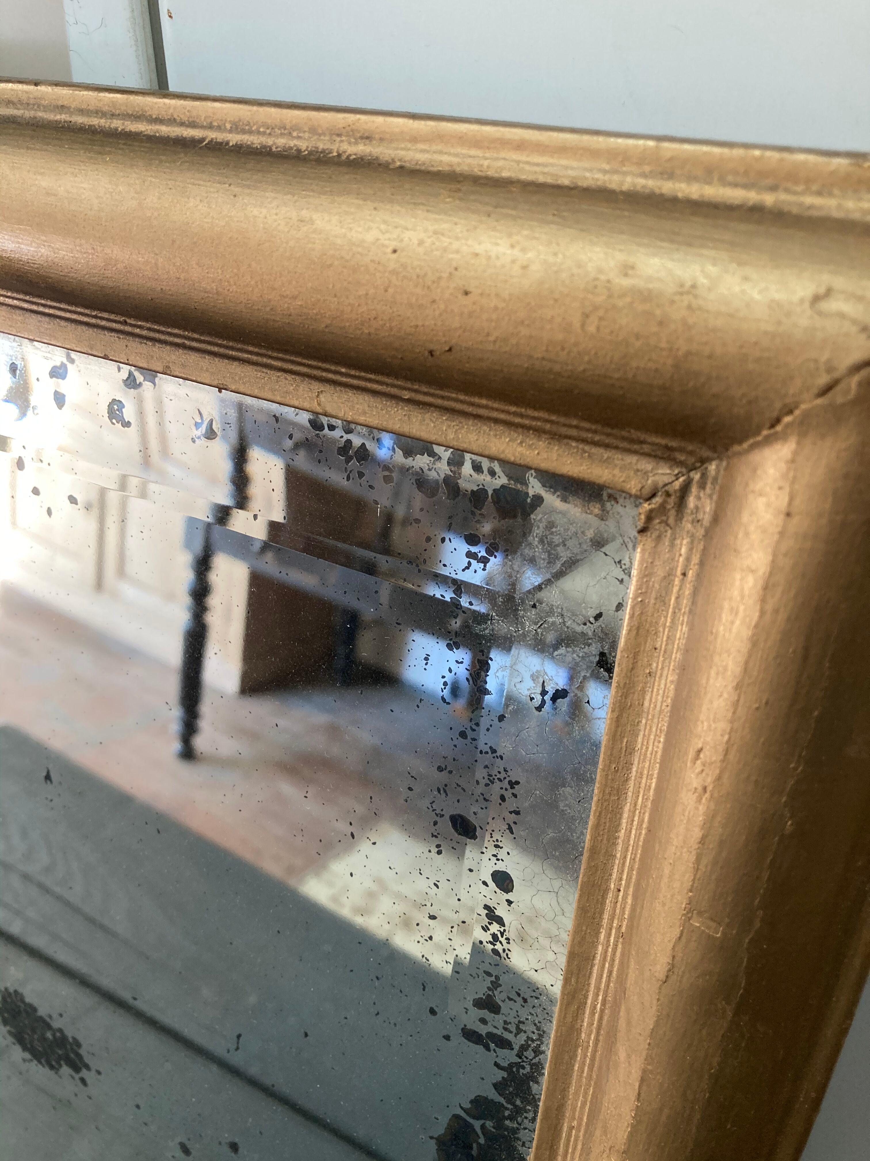 Gilded wooden mirror