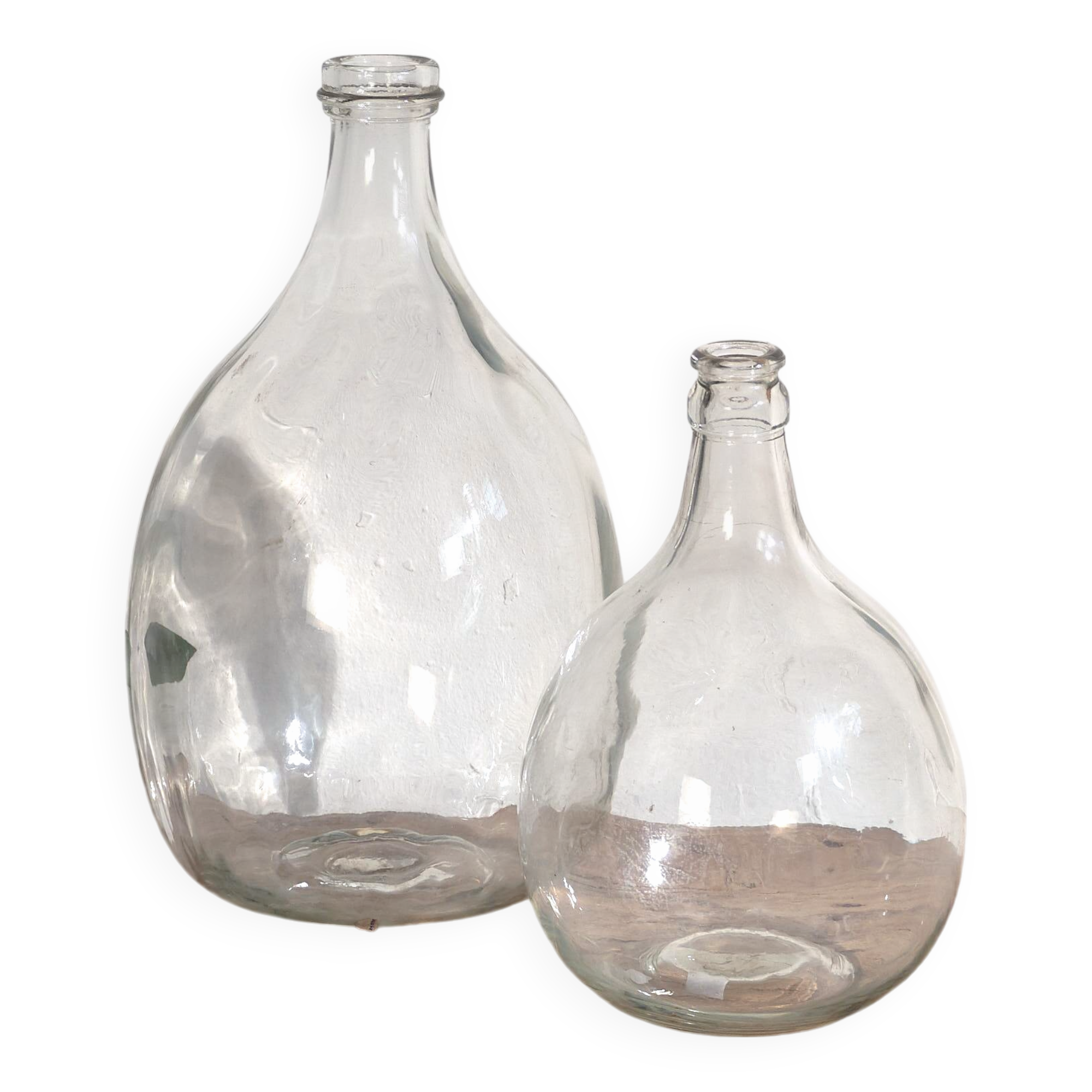 Antique glass demijohns (c.1920). Set of 2 pieces