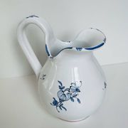 Moustiers pitcher with blue floral decoration