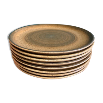 8 Longchamp enamelled stoneware plates, 1970