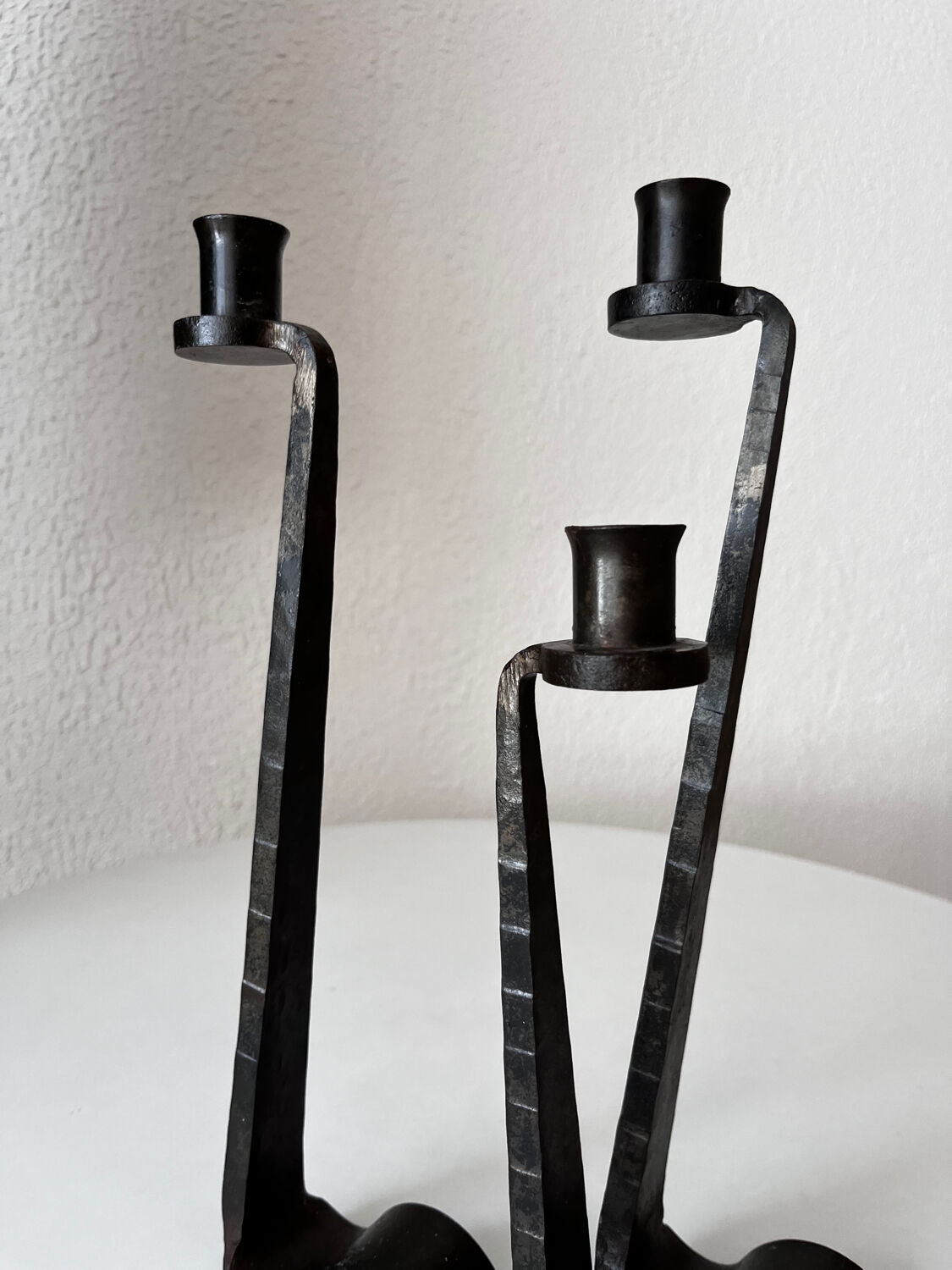 Brutalist wrought iron candlestick pair