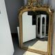Large gilded mirror with acanthus leaf pediment H150 L98