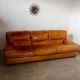 Vintage 3-seater sofa in Camel brown leather design roche bobois France from the 70s