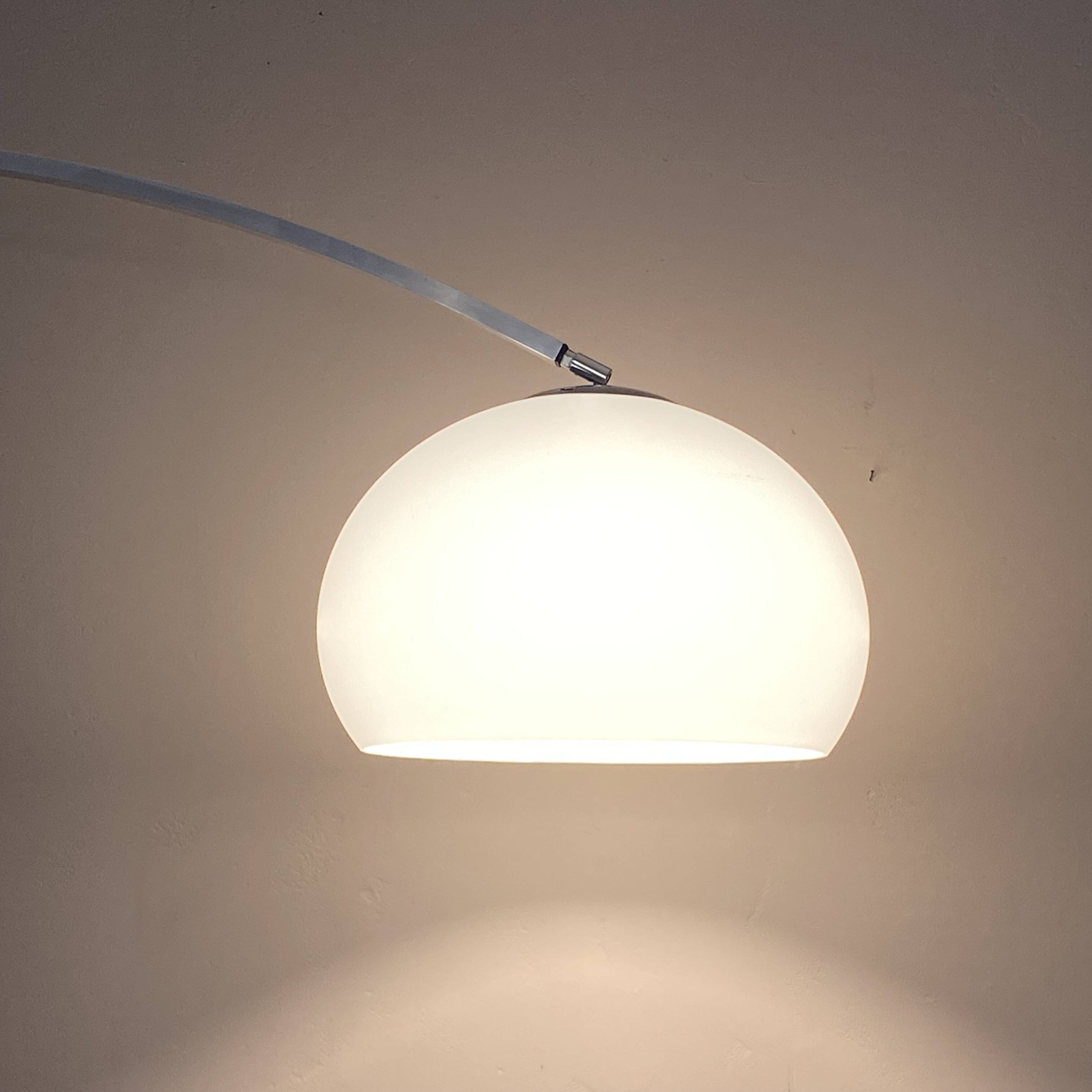 Guzzini arc floor lamp. 1970. Italy. Marble base.