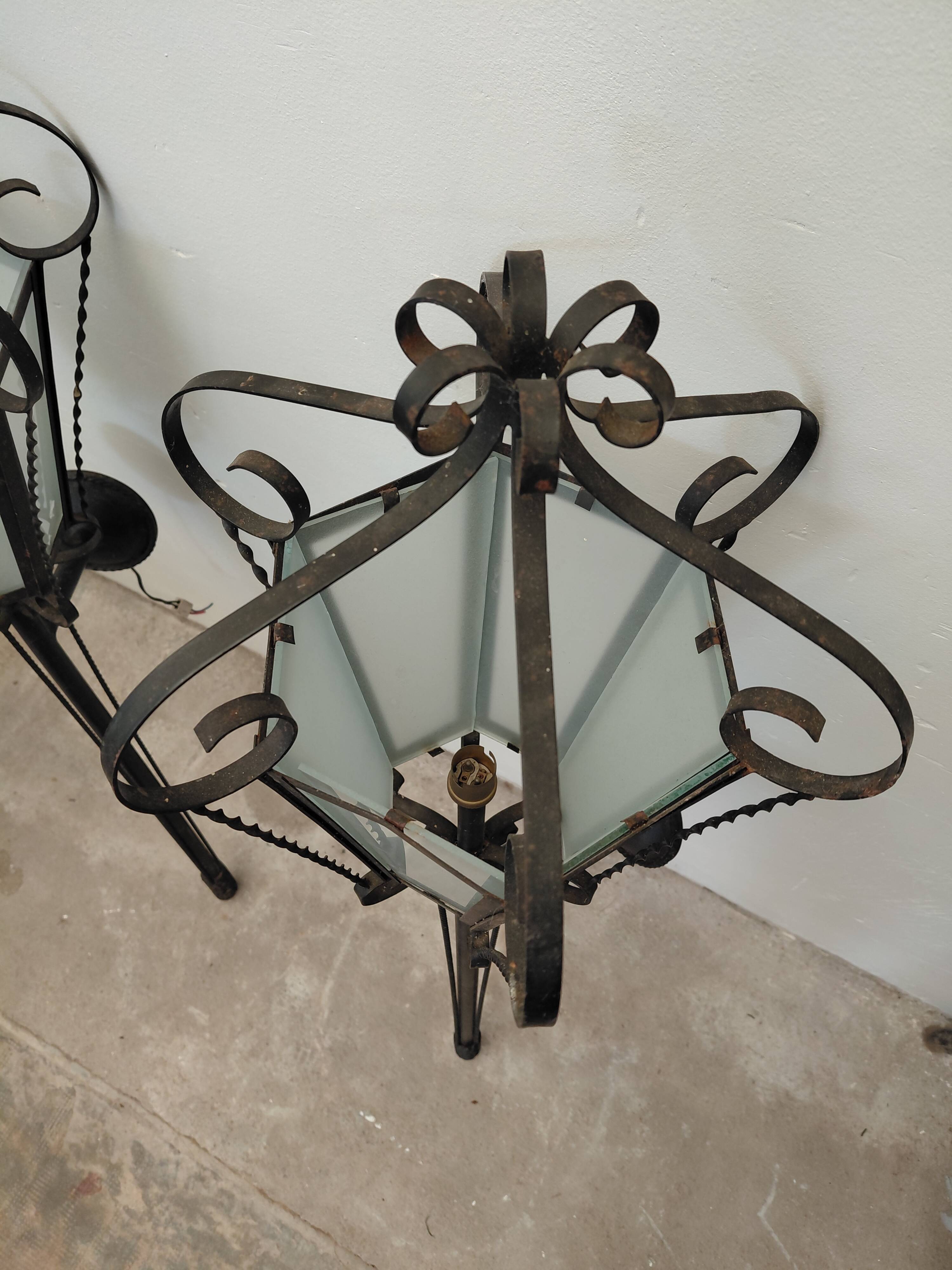 Pair of wrought iron wall sconces, 1950