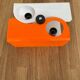 Vintage two-light wall lamp, ABS orange and white, France 1970