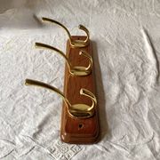 Vintage wall coat rack in lacquered wood - 3 golden hooks