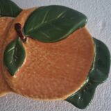 Orange trompe l'oeil slip dish.