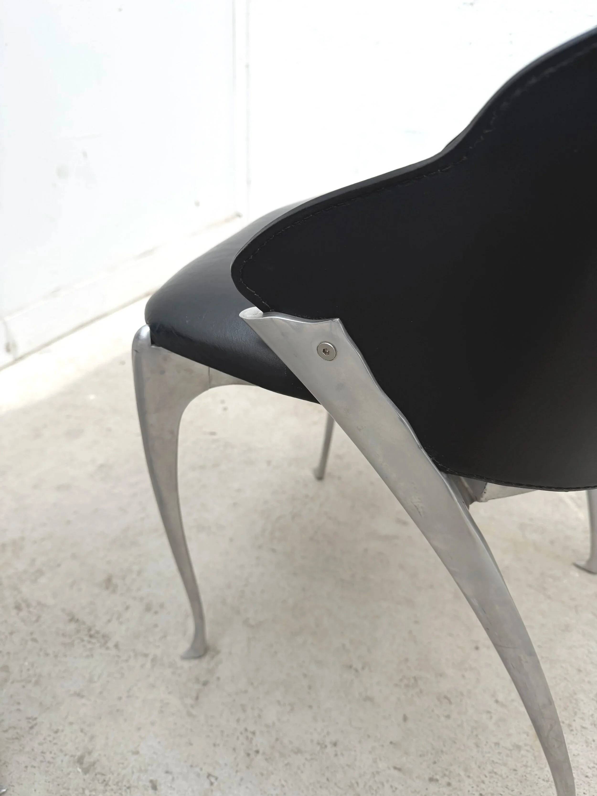 Set of 4 chairs by Bernard Dequet for Protis France Design in cast aluminum and leather, France 1980