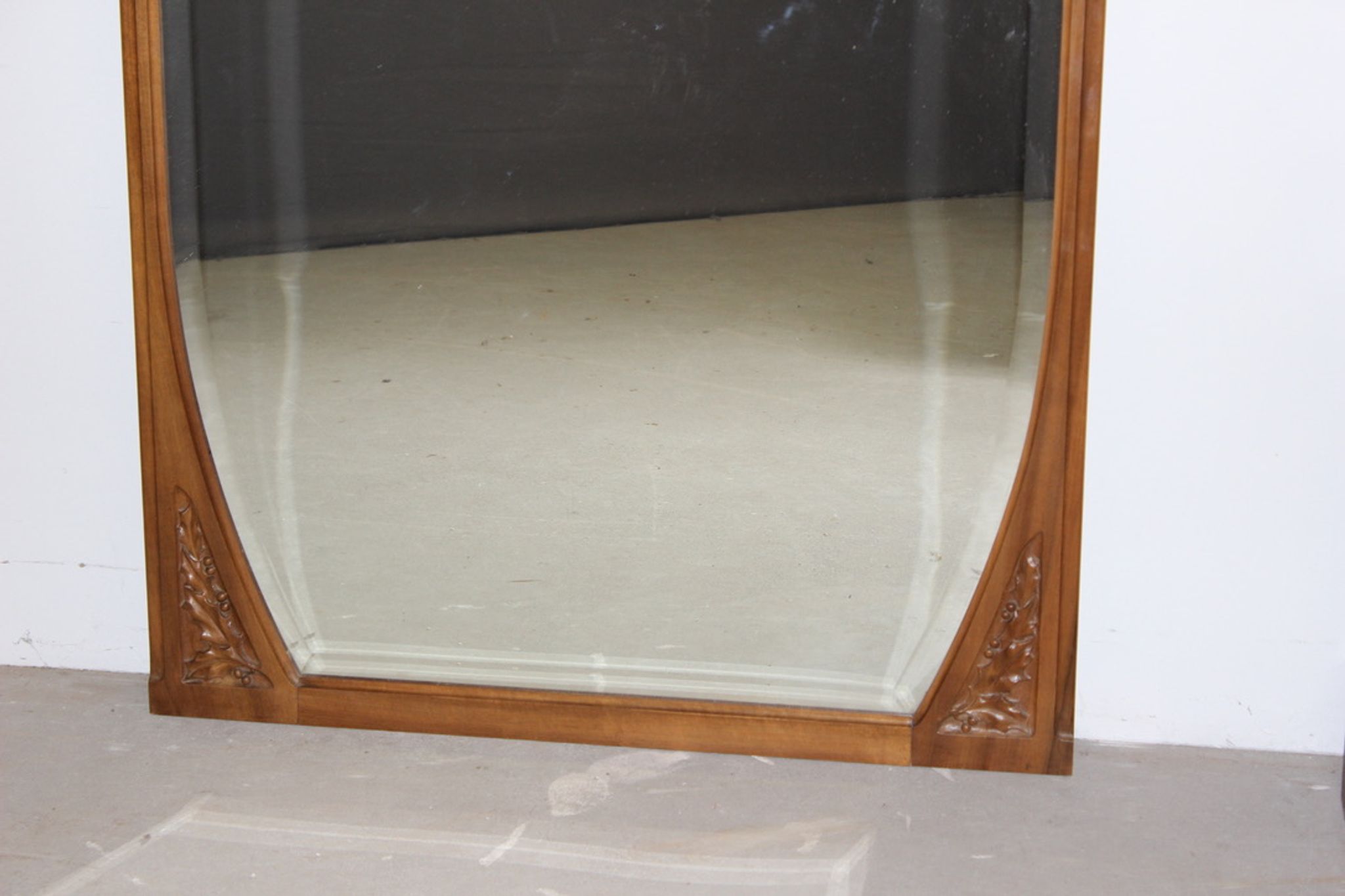 Art Nouveau walnut mirror decorated with holly leaves circa 1900 105x171cm