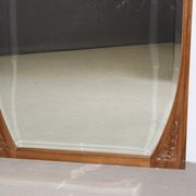 Art Nouveau walnut mirror decorated with holly leaves circa 1900 105x171cm