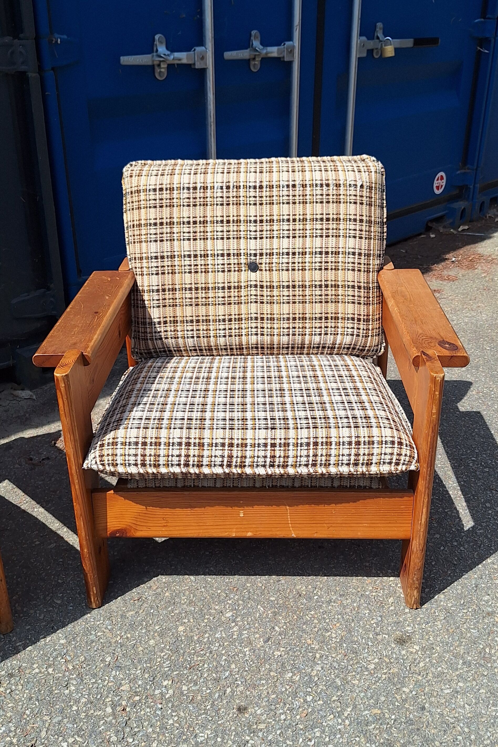 Brutalist-style bench and armchairs in 1970s pine.