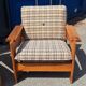 Brutalist-style bench and armchairs in 1970s pine.