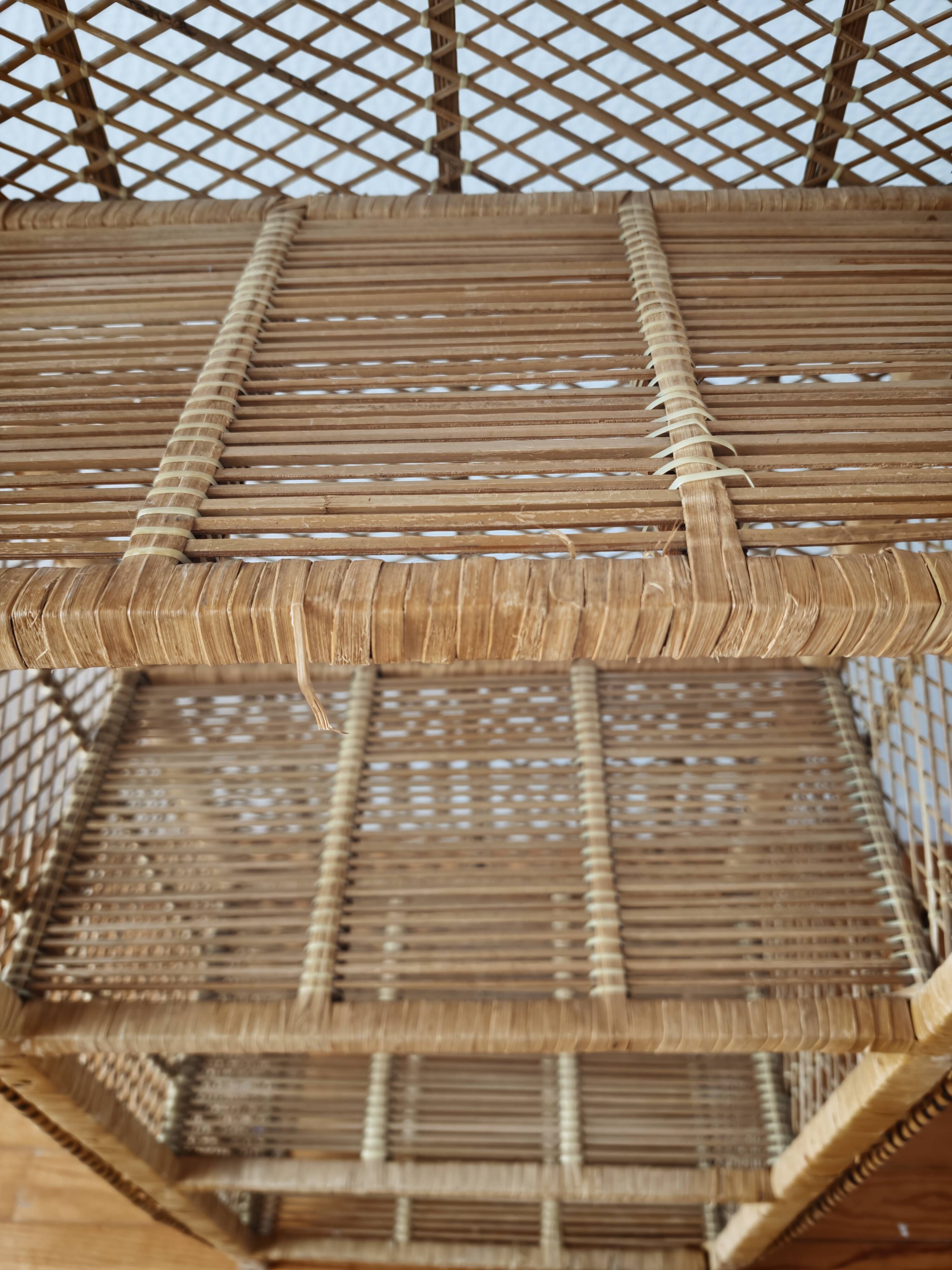 Rattan shelf on legs circa 1960