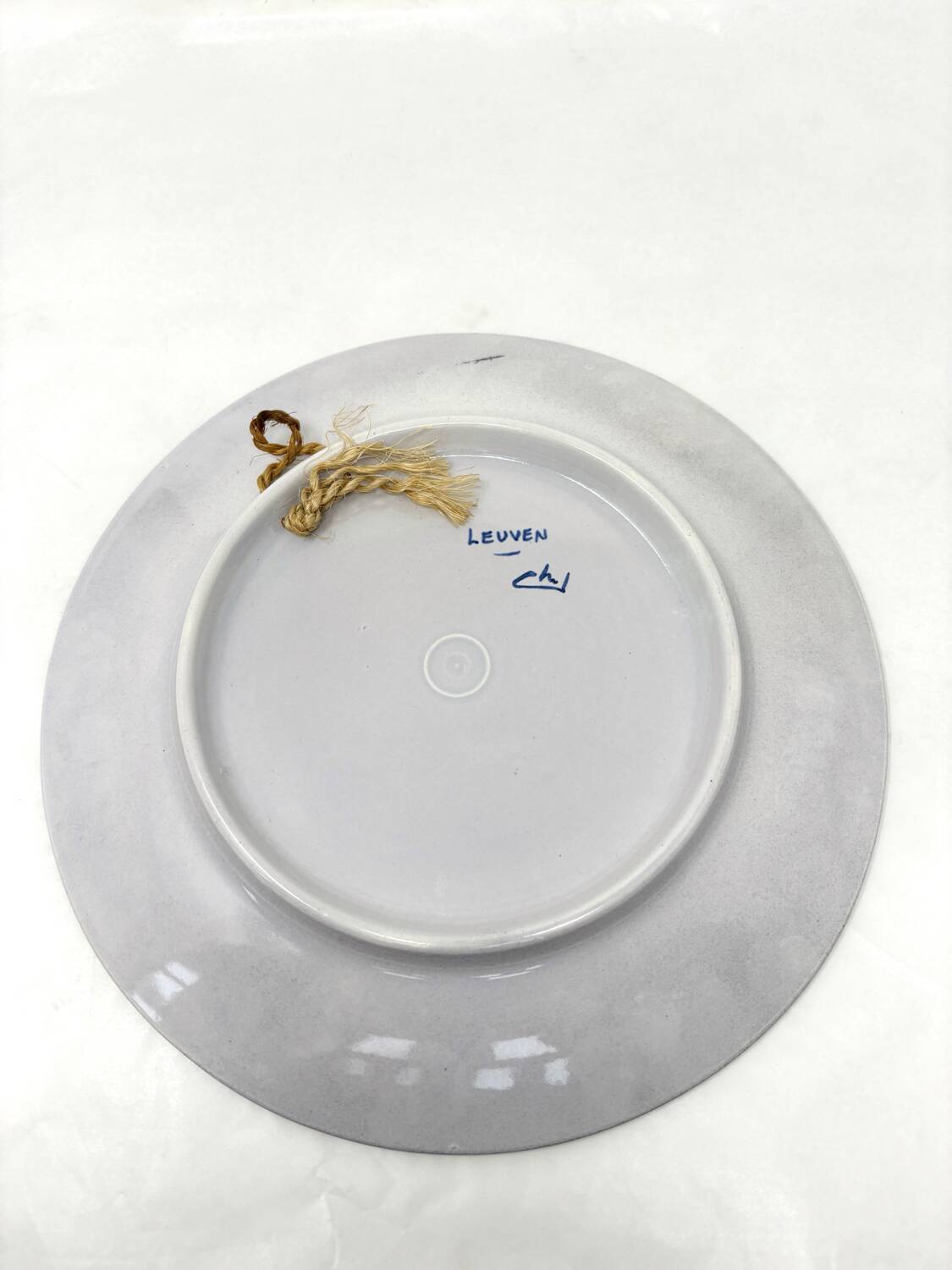 Ceramic plate with fish design from Louvain